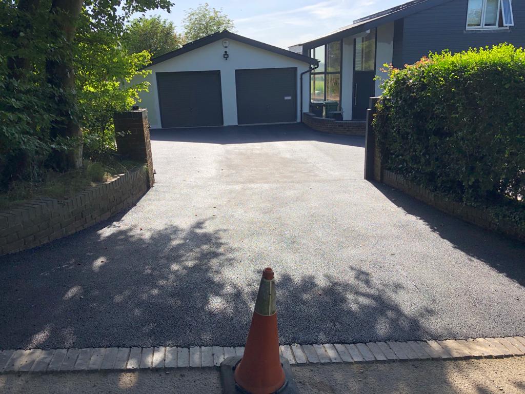 This is a photo of a bitumen driveway which is in the process of being installed by Goondiwindi Asphalt & Bitumen Surfacing